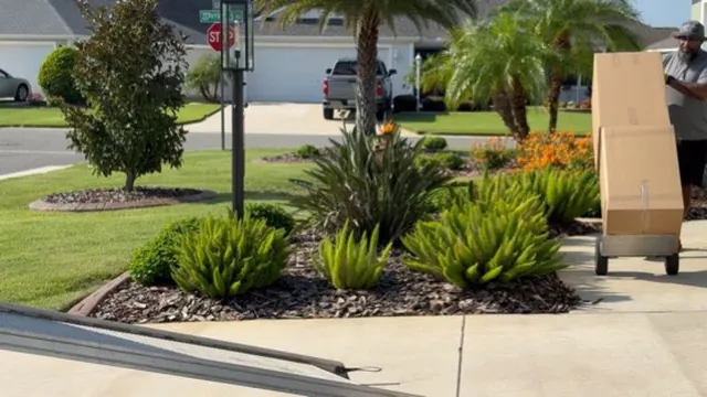Moving truck ramp set up in driveway for residential moving services in Florida