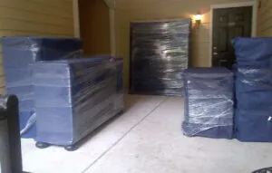furniture wrapped for apartment move in The Villages FL with protective padding and shrink wrap
